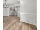 Living room featuring hardwood floors, white trim and stairs to the second floor at 2670 Thornbury Way, Atlanta, GA 30349