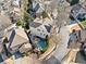 Aerial view of the home showcasing a backyard pool, patio area, and well-manicured landscaping at 3015 Woodvale Ct, Alpharetta, GA 30022