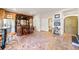 Basement bar area with hardwood floors and brick accents at 3015 Woodvale Ct, Alpharetta, GA 30022