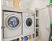 Well-organized laundry room with modern washer and dryer units at 3015 Woodvale Ct, Alpharetta, GA 30022