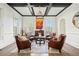 Bright living room with coffered ceiling, hardwood floors, and stylish seating arrangement at 3015 Woodvale Ct, Alpharetta, GA 30022