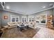 Comfortable living room with large windows and neutral color scheme at 3015 Woodvale Ct, Alpharetta, GA 30022