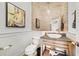 Unique powder room with stone-look walls, modern vanity, and stylish decor at 3015 Woodvale Ct, Alpharetta, GA 30022