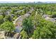 A tranquil suburban neighborhood with tree-lined streets and houses set against a skyline backdrop at 3232 Cates Ne Ave, Brookhaven, GA 30319