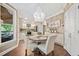 Eat-in kitchen with backyard access and stylish chandelier at 3232 Cates Ne Ave, Brookhaven, GA 30319