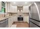 Well-equipped kitchen with stainless steel appliances, granite countertops, and ample cabinet space at 3232 Cates Ne Ave, Brookhaven, GA 30319