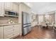 Stainless steel refrigerator and microwave in modern eat-in kitchen at 3232 Cates Ne Ave, Brookhaven, GA 30319