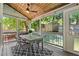 Outdoor screened porch with table and fence view at 3232 Cates Ne Ave, Brookhaven, GA 30319