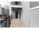 Outdoor balcony with sliding glass door and metal railing at 602 Granville Ct, Sandy Springs, GA 30328