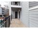 Outdoor patio with a wrought iron fence and railing with exterior home view at 602 Granville Ct, Sandy Springs, GA 30328