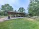 Community picnic pavilion with picnic tables and a view of the playground at 907 Fox Croft Pl, Canton, GA 30114