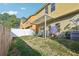 Spacious backyard with covered patio offers outdoor living and dining at 1600 Yukon Ct, Atlanta, GA 30349