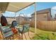 A shady, covered patio provides space for outdoor dining and entertainment at 1600 Yukon Ct, Atlanta, GA 30349