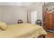 Bedroom features a four-poster bed, neutral walls, and classic decor at 1600 Yukon Ct, Atlanta, GA 30349