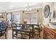 Bright dining area featuring a wooden table with bench seating and stylish decor at 1600 Yukon Ct, Atlanta, GA 30349