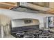 Modern kitchen appliances including stainless steel gas range, microwave, and coffee maker at 1600 Yukon Ct, Atlanta, GA 30349