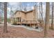 Exterior of a home with a deck, siding, and a private setting surrounded by mature trees at , Marietta, GA 30068