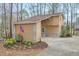 Charming home exterior with well-manicured landscaping, concrete driveway, and welcoming entrance at , Marietta, GA 30068