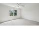 Well-lit bedroom with a neutral color palette, a large window and plush carpet at 1445 Ashwoody Ne Ct, Atlanta, GA 30319