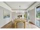 The spacious dining area is filled with natural light, offering an ideal ambiance at 1445 Ashwoody Ne Ct, Atlanta, GA 30319