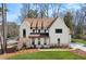 Stunning two-story home with a manicured lawn, stone accents, and a welcoming facade at 1445 Ashwoody Ne Ct, Atlanta, GA 30319