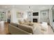 Inviting living room features fireplace, TV, modern decor, and access to patio at 1445 Ashwoody Ne Ct, Atlanta, GA 30319