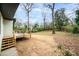Expansive backyard view showcasing a wooden deck ideal for outdoor entertainment and relaxation at 1788 Piper Se Cir, Atlanta, GA 30316
