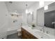 Modern bathroom featuring double vanity, tile backsplash, and bathtub with shower at 1788 Piper Se Cir, Atlanta, GA 30316