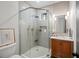 Modern bathroom with a glass-enclosed shower, sleek vanity, and stylish fixtures at 1788 Piper Se Cir, Atlanta, GA 30316