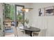 Stylish dining area with modern lighting, contemporary art, and access to the outdoor patio at 1788 Piper Se Cir, Atlanta, GA 30316