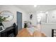Stylish hallway featuring hardwood floors, modern decor, and access to various rooms, including a bathroom at 1788 Piper Se Cir, Atlanta, GA 30316
