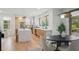 Bright eat-in kitchen features an island with marble counters, modern fixtures and stainless steel appliances at 1788 Piper Se Cir, Atlanta, GA 30316