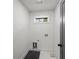 Minimalist laundry room with white walls and tile flooring at 1788 Piper Se Cir, Atlanta, GA 30316