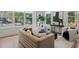 Bright living room features hardwood floors, natural light, comfortable seating, and modern decor at 1788 Piper Se Cir, Atlanta, GA 30316