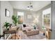 Bright and airy home office with comfortable seating and a peaceful view of the outdoors at 1788 Piper Se Cir, Atlanta, GA 30316