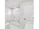 Modern bathroom featuring a glass-enclosed shower and vanity at 5619 Tillman Way, Powder Springs, GA 30127