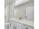 Bathroom with a tub/shower combo and white vanity at 5619 Tillman Way, Powder Springs, GA 30127