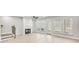 Bright living room with a fireplace, hardwood floors, and natural light at 5619 Tillman Way, Powder Springs, GA 30127