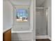 Bathroom with window view from soaking tub and glass enclosed shower at 99 Cedars Glen Way, Villa Rica, GA 30180