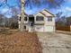 Charming two-story home with double garage and inviting front entrance at 99 Cedars Glen Way, Villa Rica, GA 30180
