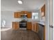Functional kitchen with stainless steel appliances and ample cabinet space at 99 Cedars Glen Way, Villa Rica, GA 30180