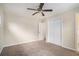 Inviting bedroom featuring plush carpeting, neutral walls, and ample closet space at 1146 Canal St, Decatur, GA 30032