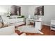 Bright home office featuring modern decor, unique artwork, and ample natural light at 1412 Great Shoals Dr, Lawrenceville, GA 30045