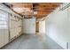 Unfinished basement with exposed ceiling at 2202 Troutdale Dr, Decatur, GA 30032