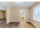 Dining room featuring wood floors and views into the kitchen at 2202 Troutdale Dr, Decatur, GA 30032