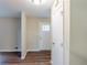 Foyer with a white front door and dark-toned wood flooring at 2202 Troutdale Dr, Decatur, GA 30032
