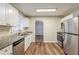 Modern kitchen with stainless steel appliances and granite countertops at 2202 Troutdale Dr, Decatur, GA 30032