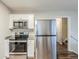 Well-equipped kitchen with stainless steel appliances, granite counters, and convenient layout at 2202 Troutdale Dr, Decatur, GA 30032