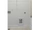 Unfinished closet features hanging rack, shelving, and utility hookups at 2390 Edgar Park Pl # 102, Duluth, GA 30096