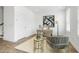 Inviting home office with a cozy chair, contemporary desk, and bright windows, creating a serene and efficient workspace at 2390 Edgar Park Pl # 102, Duluth, GA 30096